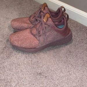 Dusty pink New Balance shoes